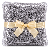 Blanket folded, tied with a ribbon and sealed in a clear PP bag